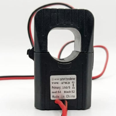 A black analog current transformer with red and black wires, featuring a white label with technical specifications, on a white background.
